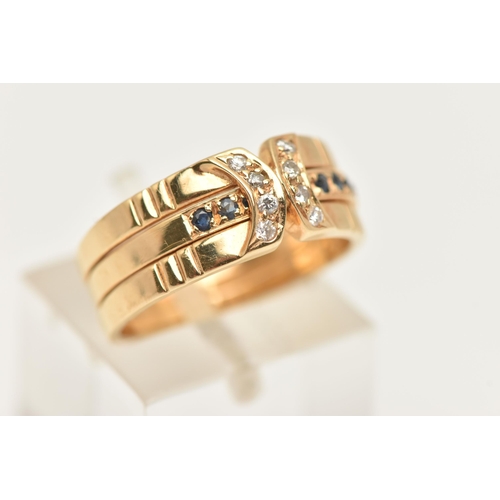 32 - A YELLOW METAL DIAMOND AND SAPPHIRE SET RING, three bands with the centre able to rotate set with a ... 