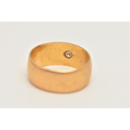 38 - A 22CT GOLD DIAMOND SET WIDE BAND RING, star set with a round brilliant cut diamond, estimated diamo... 