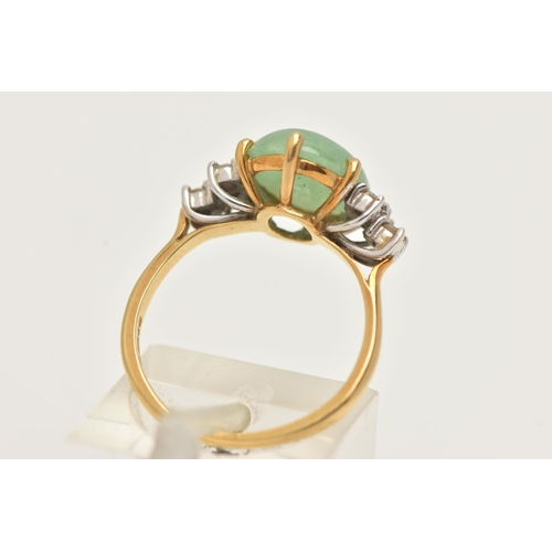 44 - AN 18CT GOLD JADE AND DIAMOND RING, set with an oval green jade cabochon in a six claw setting, flan... 