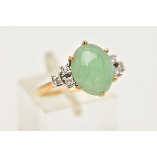 44 - AN 18CT GOLD JADE AND DIAMOND RING, set with an oval green jade cabochon in a six claw setting, flan... 