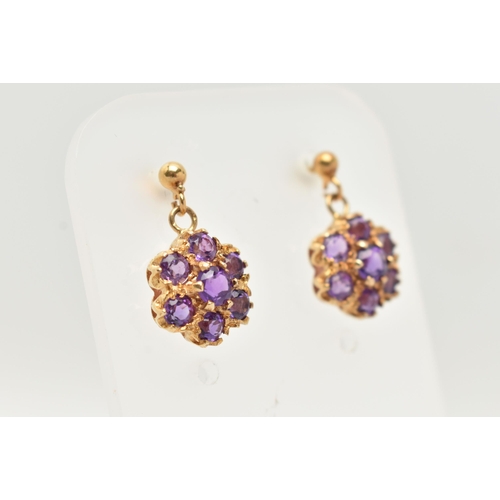 58 - A PAIR OF 9CT GOLD AMETHST DROP EARRINGS, each earring of a circular cluster drop set with seven cir... 