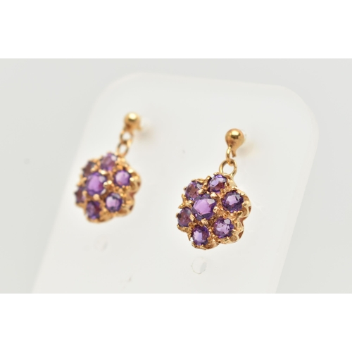 58 - A PAIR OF 9CT GOLD AMETHST DROP EARRINGS, each earring of a circular cluster drop set with seven cir... 