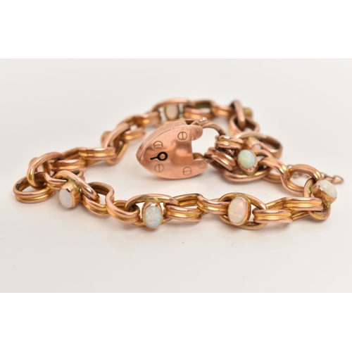 75 - AN EARLY 20TH CENTURY 9CT ROSE GOLD OPAL BRACELET, designed as a series of ten white opal cabochons ... 