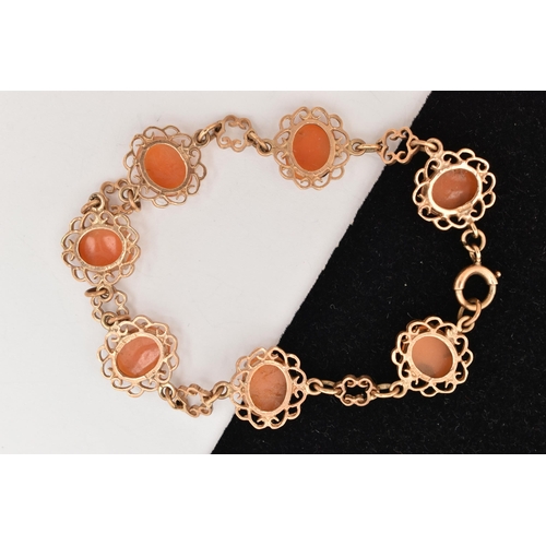 76 - A 9CT GOLD CAMEO BRACELET, designed as a series of seven oval carved shell cameos each depicting a l... 