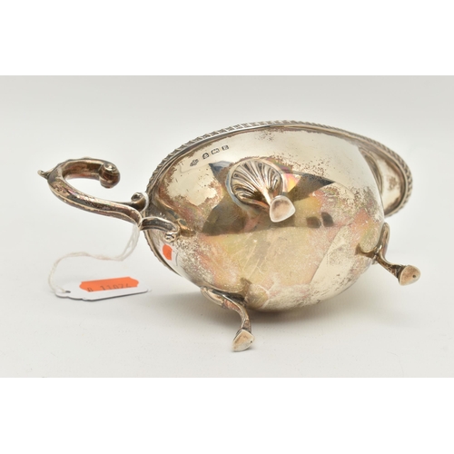 123 - A GEORGE V SILVER SAUCE BOAT, rope twist detail to the sauce boat rim, raised on three hoof feet, c ... 