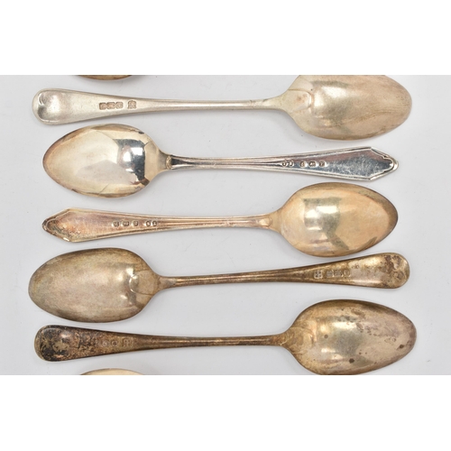 134 - AN ASSORTMENT OF SILVER TEASPOONS, eleven assorted teaspoons, all hallmarked with British hallmarks,... 