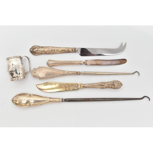 137 - AN ASSORTMENT OF SILVER AND WHITE METAL, to include two silver handled button hooks, a silver handle... 