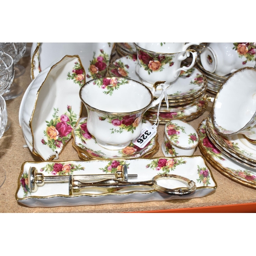 326 - A QUANTITY OF ROYAL ALBERT 'OLD COUNTRY ROSES' TEA AND DINNERWARE comprising twelve tea cups (four w... 