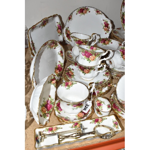 326 - A QUANTITY OF ROYAL ALBERT 'OLD COUNTRY ROSES' TEA AND DINNERWARE comprising twelve tea cups (four w... 