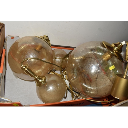 330 - FOUR BOXES AND LOOSE LAMPS AND SHADES to include three Ikea glass white spherical hanging lamps, app... 