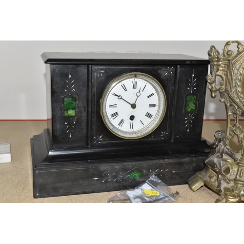 334 - A BLACK SLATE TIMEPIECE WITH A GOLD COLOURED CLOCK comprising a black slate mantel clock with three ... 