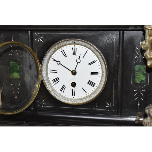 334 - A BLACK SLATE TIMEPIECE WITH A GOLD COLOURED CLOCK comprising a black slate mantel clock with three ... 