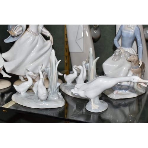 347 - A COLLECTION OF LLADRO, NAO AND SIMILAR FIGURES, to include Lladro: Girl with Goose and Dog, no 4866... 