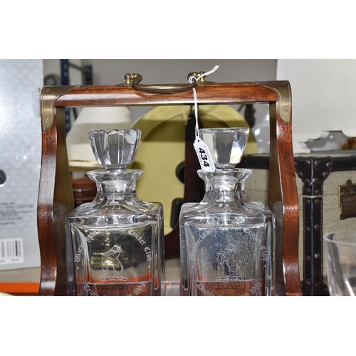 434 - A SMALL COLLECTION OF CRYSTAL ITEMS SPORTS RELATED, a dark wood with brass detail tantalus caddy wit... 