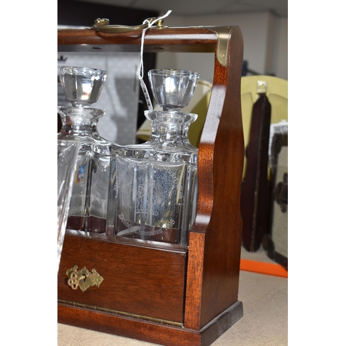 434 - A SMALL COLLECTION OF CRYSTAL ITEMS SPORTS RELATED, a dark wood with brass detail tantalus caddy wit... 