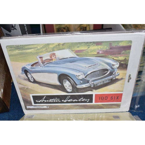 441 - THREE BOXES AND LOOSE MISCELLANEOUS, to include steam railway books and DVDs, a cast iron sign sayin... 