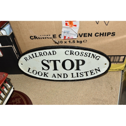 441 - THREE BOXES AND LOOSE MISCELLANEOUS, to include steam railway books and DVDs, a cast iron sign sayin... 