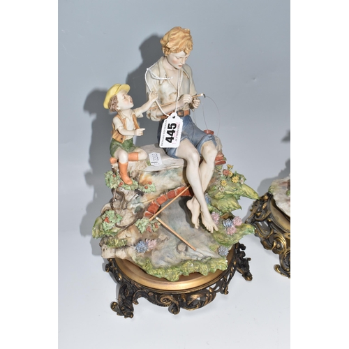 445 - A PAIR OF FISHING THEMED CAPODIMONTE FIGURES designed by Benacchio comprising a fisherman with a rod... 