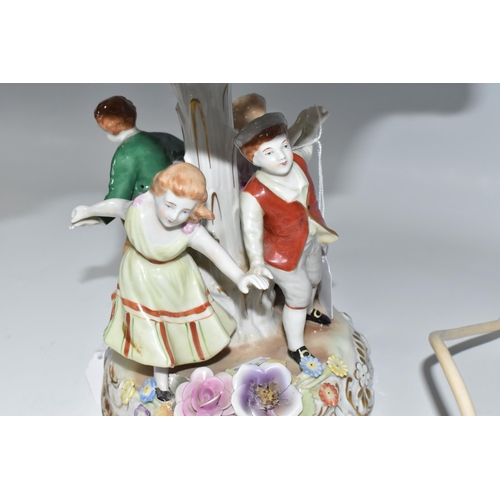 446 - AN EAST-GERMAN TWENTIETH CENTURY PORCELAIN FIGURAL LAMP with a pierced rococo style shade with litho... 