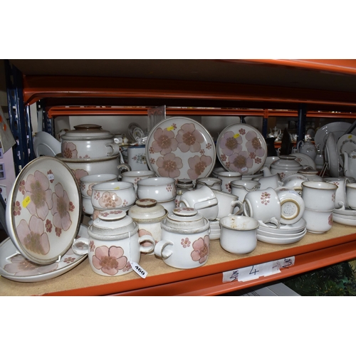 460 - A DENBY 'GYPSY' DINNER AND TEA SET comprising a butter dish, five egg cups, a salt and a pepper shak... 