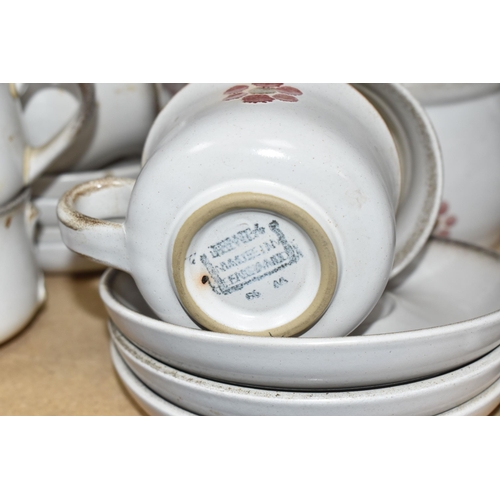 460 - A DENBY 'GYPSY' DINNER AND TEA SET comprising a butter dish, five egg cups, a salt and a pepper shak... 