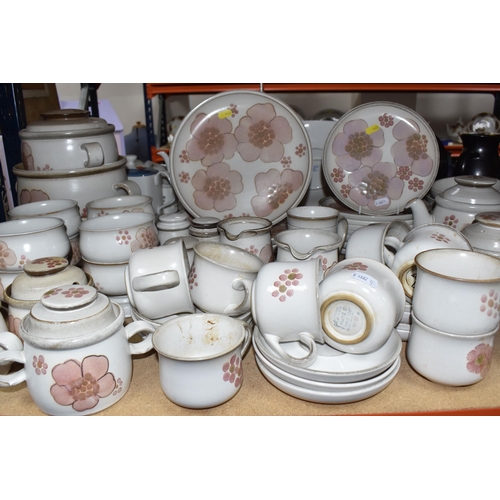 460 - A DENBY 'GYPSY' DINNER AND TEA SET comprising a butter dish, five egg cups, a salt and a pepper shak... 
