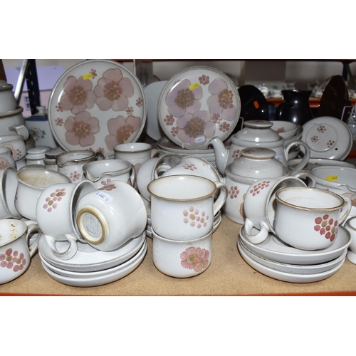 460 - A DENBY 'GYPSY' DINNER AND TEA SET comprising a butter dish, five egg cups, a salt and a pepper shak... 