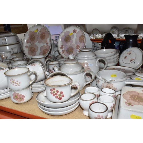 460 - A DENBY 'GYPSY' DINNER AND TEA SET comprising a butter dish, five egg cups, a salt and a pepper shak... 