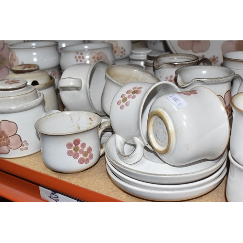 460 - A DENBY 'GYPSY' DINNER AND TEA SET comprising a butter dish, five egg cups, a salt and a pepper shak... 