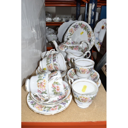 462 - TWENTY-TWO PIECES OF PARAGON 'COUNTRY LANE' TEAWARE comprising six tea cups, six saucers, six side p... 