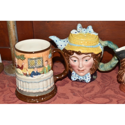 500 - A COLLECTION OF THREE BESWICK CHARACTER TEAPOTS, comprising two 'Dolly Varden' 1203 and one Peggotty... 