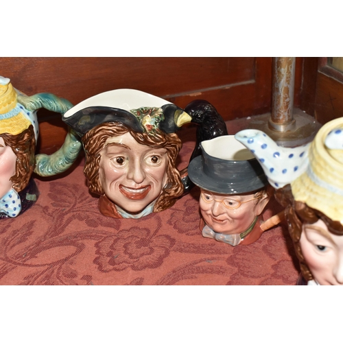 500 - A COLLECTION OF THREE BESWICK CHARACTER TEAPOTS, comprising two 'Dolly Varden' 1203 and one Peggotty... 