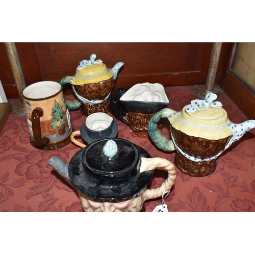 500 - A COLLECTION OF THREE BESWICK CHARACTER TEAPOTS, comprising two 'Dolly Varden' 1203 and one Peggotty... 