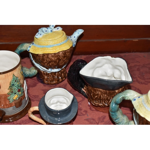 500 - A COLLECTION OF THREE BESWICK CHARACTER TEAPOTS, comprising two 'Dolly Varden' 1203 and one Peggotty... 