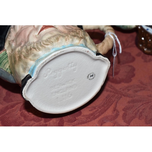 500 - A COLLECTION OF THREE BESWICK CHARACTER TEAPOTS, comprising two 'Dolly Varden' 1203 and one Peggotty... 