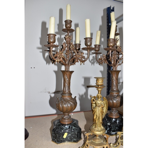 380 - A PAIR OF FRENCH CANDELABRAS ON BLACK MARBLE WEIGHTED BASES WITH TWO FIGURATIVE ORMOLU CANDLE STICKS... 