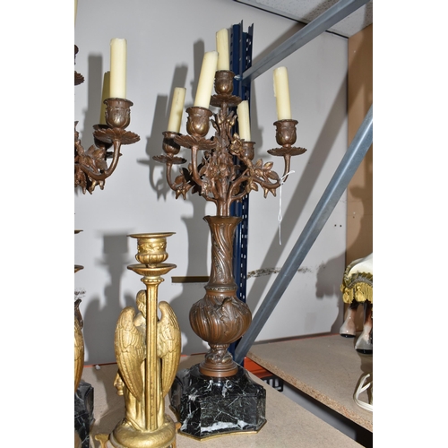 380 - A PAIR OF FRENCH CANDELABRAS ON BLACK MARBLE WEIGHTED BASES WITH TWO FIGURATIVE ORMOLU CANDLE STICKS... 