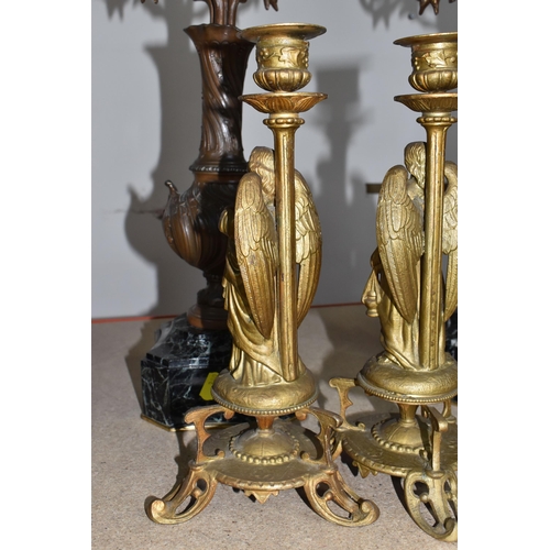 380 - A PAIR OF FRENCH CANDELABRAS ON BLACK MARBLE WEIGHTED BASES WITH TWO FIGURATIVE ORMOLU CANDLE STICKS... 