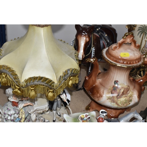 390 - A GROUP OF DECORATIVE ORNEMENTS AND LAMPS, to include a vintage table lamp made in GDR 1859 marked o... 