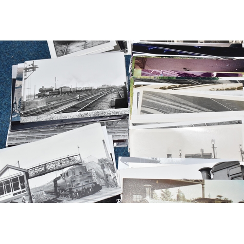 403 - A BOX OF MAINLY BLACK AND WHITE RAILWAY PHOTOGRAPHS, approximately three hundred postcard sized phot... 