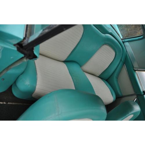 1008 - A 1959 FORD THUNDERBIRD TWO DOOR COUPE CAR, in turquoise and white with a 7038cc V8 petrol engine, c... 