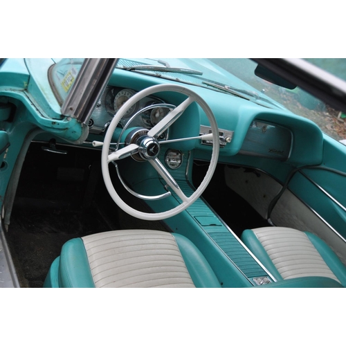 1008 - A 1959 FORD THUNDERBIRD TWO DOOR COUPE CAR, in turquoise and white with a 7038cc V8 petrol engine, c... 