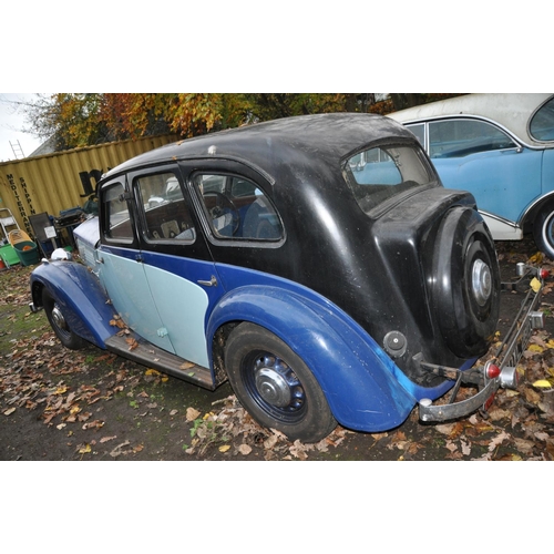 1010 - A 1937 WOLSELEY 14-56 FOOR DOOR SALOON CAR, in blue with an 1818cc petrol engine, four speed manual ... 