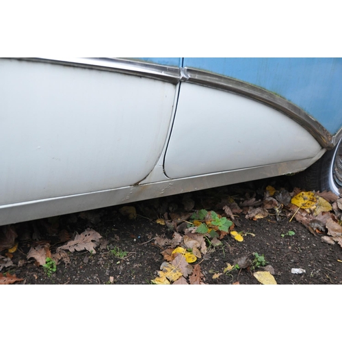 1011 - A 1956 BUICK RIVIERA THREE DOOR COUPE CAR, in blue and white with matching vinyl interior, a 6000cc ... 