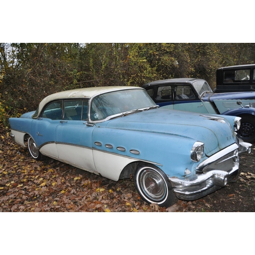 1011 - A 1956 BUICK RIVIERA THREE DOOR COUPE CAR, in blue and white with matching vinyl interior, a 6000cc ... 