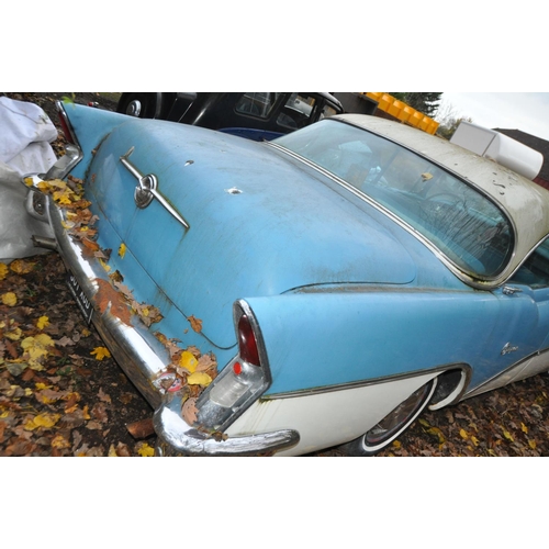 1011 - A 1956 BUICK RIVIERA THREE DOOR COUPE CAR, in blue and white with matching vinyl interior, a 6000cc ... 