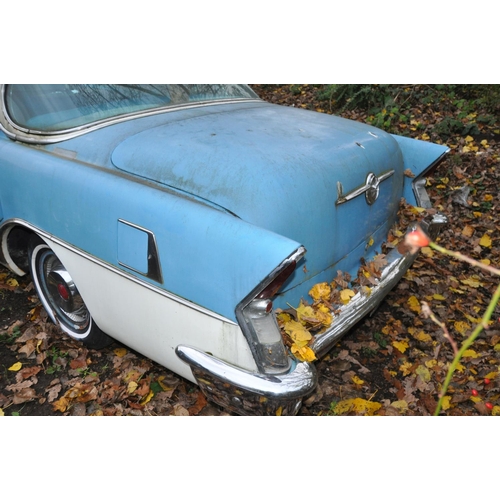 1011 - A 1956 BUICK RIVIERA THREE DOOR COUPE CAR, in blue and white with matching vinyl interior, a 6000cc ... 