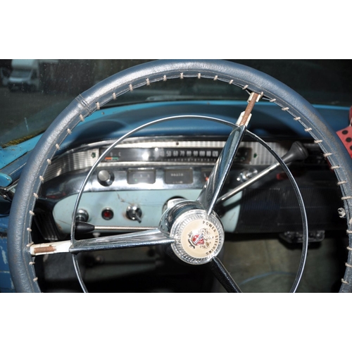 1011 - A 1956 BUICK RIVIERA THREE DOOR COUPE CAR, in blue and white with matching vinyl interior, a 6000cc ... 