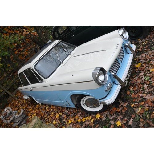 1013 - A 1970 TRIUMPH HERALD 1200 TWO DOOR SALOON CAR, in blue and white, with a 1147cc petrol engine, four... 