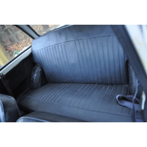 1013 - A 1970 TRIUMPH HERALD 1200 TWO DOOR SALOON CAR, in blue and white, with a 1147cc petrol engine, four... 